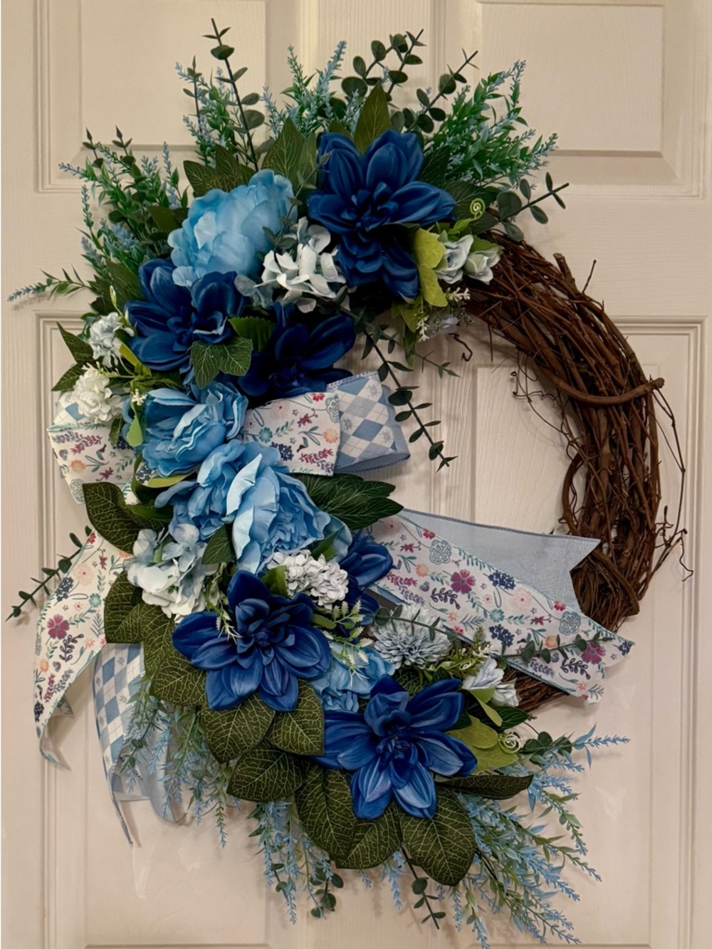 Grapevine Wreath with Blue Mixed Floral Blooms and Bow